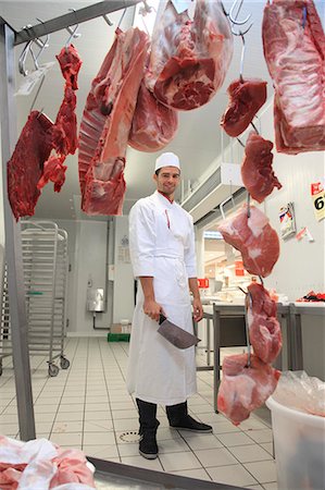 France, supermarket, young butcher. Stock Photo - Rights-Managed, Code: 877-06835757