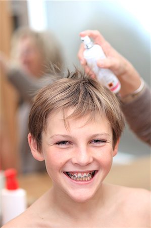 fixatif pour cheveux - France, young boy and hair problem Photographie de stock - Rights-Managed, Code: 877-06835817