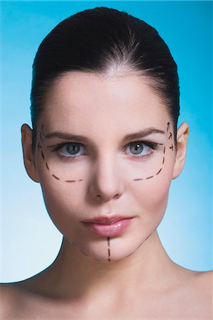 simsearch:877-06836181,k - Young woman with presurgical markings on face Foto de stock - Con derechos protegidos, Código: 877-06836295