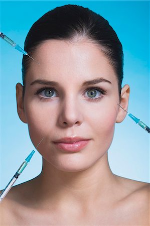 simsearch:877-06836182,k - Young woman with syringes Stock Photo - Rights-Managed, Code: 877-06836290