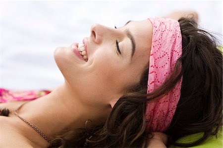 Young woman lying, oudoors Stock Photo - Rights-Managed, Code: 877-06832316