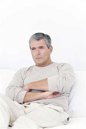 sentado - Portrait of a senior man, indoors Foto de stock - Con derechos protegidos, Código: 877-06832407