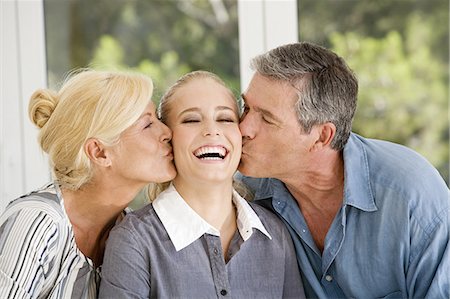 simsearch:877-06832488,k - Mature couple kissing a young woman Stock Photo - Rights-Managed, Code: 877-06832441