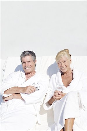 simsearch:877-06832482,k - Mature couple wearing bathrobe, sitting on a terrace Foto de stock - Con derechos protegidos, Código: 877-06832479