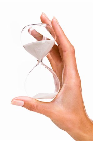 Woman's hands holding a hourglass Stock Photo - Rights-Managed, Code: 877-06832586