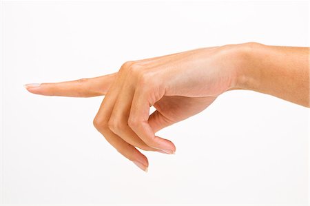 finger white background - Woman's hand pointing the finger Stock Photo - Rights-Managed, Code: 877-06832659