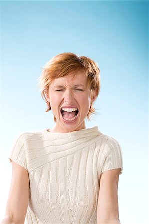 red head screaming - Portrait of young woman screaming Foto de stock - Con derechos protegidos, Código: 877-06832811