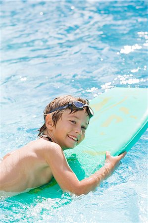 Boy having fun in pool Stock Photo - Rights-Managed, Code: 877-06832821