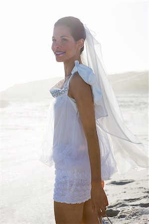 Young woman on the beach Stock Photo - Rights-Managed, Code: 877-06833185