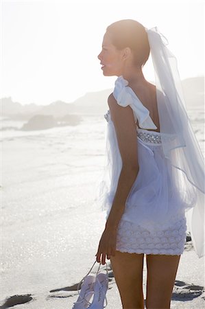 Young woman on the beach Stock Photo - Rights-Managed, Code: 877-06833186