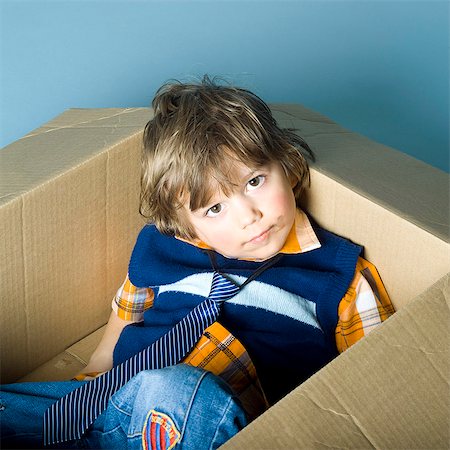 simsearch:877-06833387,k - Little boy playing with cardboard Stock Photo - Rights-Managed, Code: 877-06833312