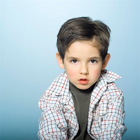 simsearch:877-06833353,k - Little boy looking at camera Photographie de stock - Rights-Managed, Code: 877-06833345