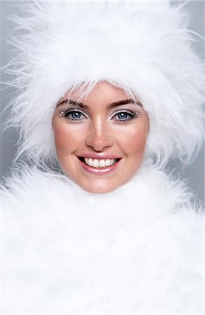 Woman wearing white fur Photographie de stock - Rights-Managed, Code: 877-06833569