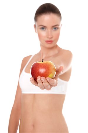 simsearch:877-06833602,k - Woman in underwear holding apple Foto de stock - Con derechos protegidos, Código: 877-06833597