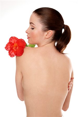 simsearch:877-06833642,k - Naked woman with flower on her shoulder Stock Photo - Rights-Managed, Code: 877-06833632
