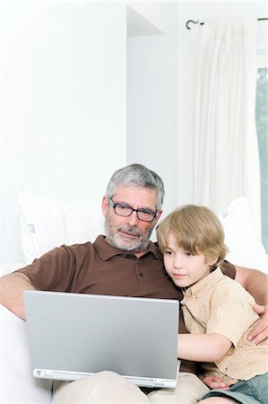 simsearch:877-06835852,k - Man and child using laptop Stock Photo - Rights-Managed, Code: 877-06833645