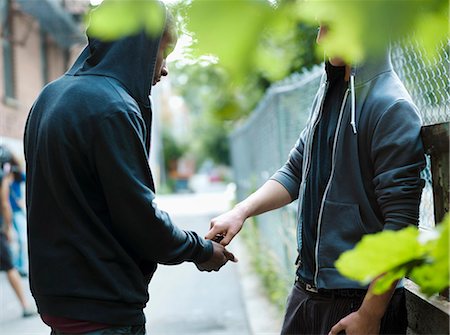 simsearch:877-06833900,k - Teenager dealing drugs Stock Photo - Rights-Managed, Code: 877-06833905