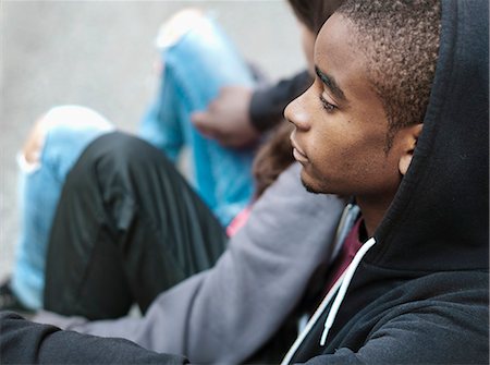 simsearch:877-06833900,k - Teenagers sitting in the street Stock Photo - Rights-Managed, Code: 877-06833990