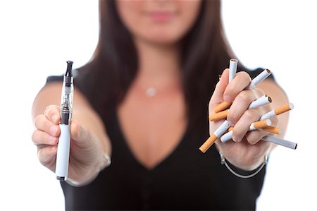 smoking (human activity) - France, woman holding cigarettes and electronic cigarette. Stock Photo - Rights-Managed, Code: 877-07460572
