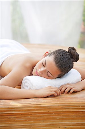 Young woman sleeping on her stomach Stock Photo - Rights-Managed, Code: 877-08026460