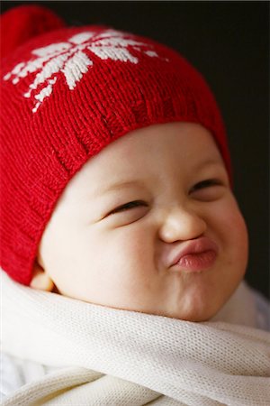 studio shot babies - A 15 months baby boy with a cap and a scarf Stock Photo - Rights-Managed, Code: 877-08079120