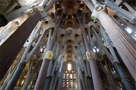 sagrada familia interior - Sagrada Familia basilica pillars and stained glass. Barcelona. Spain. Stock Photo - Rights-Managed, Code: 877-08127913