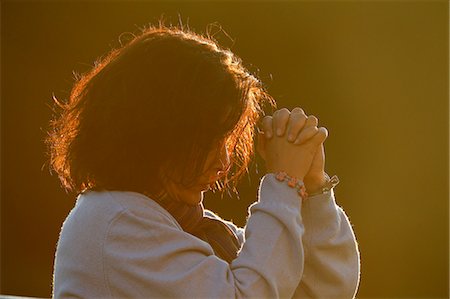 simsearch:877-08127926,k - Woman praying. Saint-Gervais-les-Bains. France. Photographie de stock - Rights-Managed, Code: 877-08127924