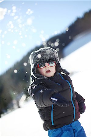 France, a 3 years old little boy playing with snow in the mountains, in winter Photographie de stock - Rights-Managed, Code: 877-08128002