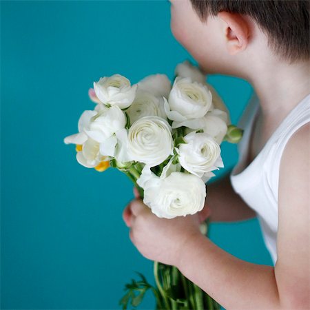 Little boy with flowers Stock Photo - Rights-Managed, Code: 877-08128084