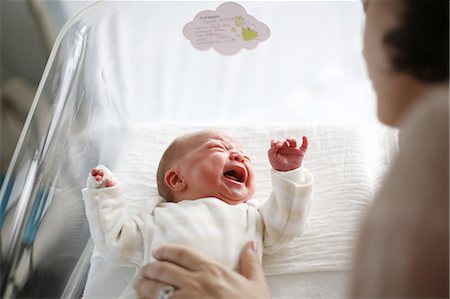 people looking tired - A new-born at the maternity ward Stock Photo - Rights-Managed, Code: 877-08128219