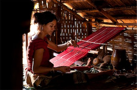 south east asia textiles - Camdodia, Ratanakiri Province, Phomkres village, Pel Nou weaves a traditional blanket called "puy" Stock Photo - Rights-Managed, Code: 877-08128320