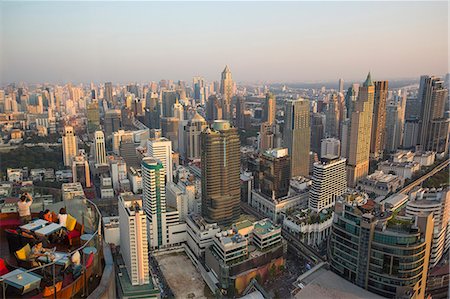 Thailand, Bangkok City, Downtown Bangkok skyline at sunset Foto de stock - Con derechos protegidos, Código: 877-08128414