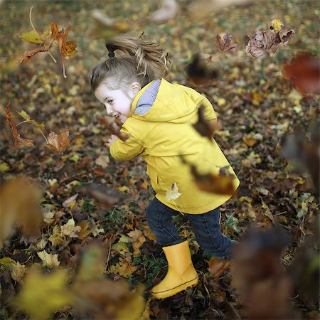 simsearch:877-08129127,k - A little girl playing with dead leaves Stock Photo - Rights-Managed, Code: 877-08128944