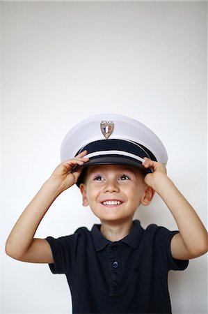 simsearch:877-08079108,k - Little boy dressed up as a policeman Photographie de stock - Rights-Managed, Code: 877-08128955