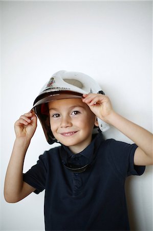 simsearch:877-06835890,k - Little boy dressed up as a fireman Foto de stock - Con derechos protegidos, Código: 877-08128961