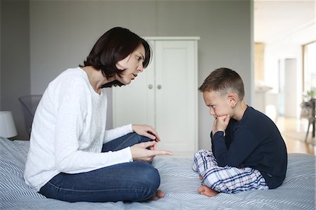 pouting - A mom scolding her 5 years old son Stock Photo - Rights-Managed, Code: 877-08129225