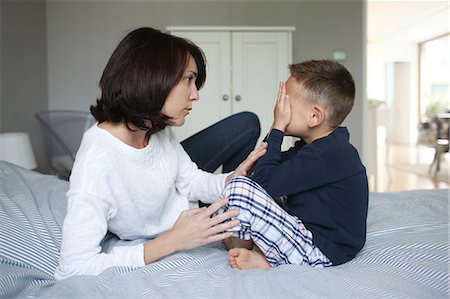 pajama - A mom consoling her 5 years old son Stock Photo - Rights-Managed, Code: 877-08129220