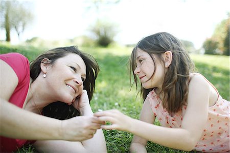 A mom posing with her 9 years old daughter Stock Photo - Rights-Managed, Code: 877-08129230