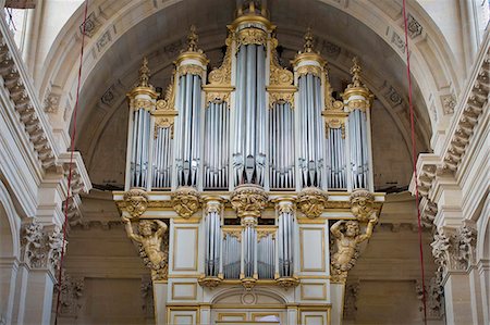 France. Paris 7th district. Invalides. The church Saint-Louis-des-Invalides. The Church of the soldiers. The organ case Fotografie stock - Rights-Managed, Codice: 877-08129420