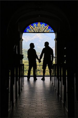 simsearch:877-08127926,k - Silhouette of a gay couple to the output of church. France. Photographie de stock - Rights-Managed, Code: 877-08129572