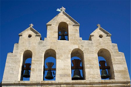 saintes-maries-de-la-mer - France, Southern France, Gard, Camargue, Saintes Maries de la Mer, the steeple of the fortified church Foto de stock - Con derechos protegidos, Código: 877-08898206