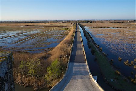 France, Southern France, Gard, Camargue, Aigues Mortes, road under Tour Carbonniere Stockbilder - Lizenzpflichtiges, Bildnummer: 877-08898214