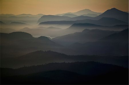 An aerial view of the landscape, islands, water and mountains of the Broughton Archipelago at sunset. Stock Photo - Rights-Managed, Code: 878-07442792