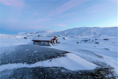 simsearch:879-09191338,k - Isolated house in fields of ice and snow, Riksgransen, Abisko, Kiruna Municipality, Norrbotten County, Lapland, Sweden Stock Photo - Rights-Managed, Code: 879-09021261