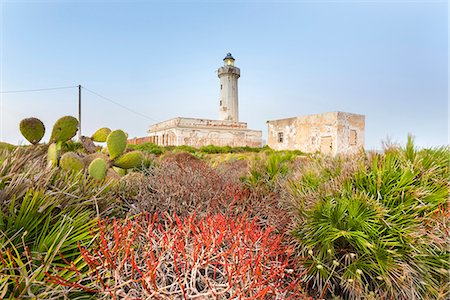 syracuse - Lighthouse of Capo Murro of Porco Europe, Italy, Sicily region, Siracusa district, Nature Reserve of Plemmirio Foto de stock - Direito Controlado, Número: 879-09021316