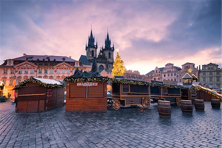 european capital cities at christmas - Prague, Czech Republic The Church of Saint Mary of Tyn photographed at dawn, in the foreground Christmas stalls Stock Photo - Rights-Managed, Code: 879-09021374