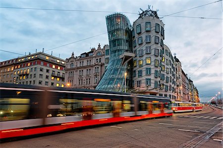 Tancici dum, Prague, Czech Republic The famous Tancici dum, in the modern district of Prague, photographed with moving bus Stock Photo - Rights-Managed, Code: 879-09021376