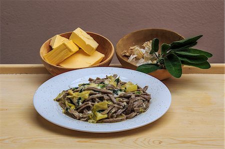 simsearch:614-06719767,k - The Pizzoccheri are the first main course of Valtellina cuisine. Lombardy. Italy. Europe Stock Photo - Rights-Managed, Code: 879-09034048