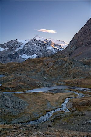 simsearch:879-09033875,k - Sunset over Levanne mountains. Alpi Graie. Gran Paradiso National Park. Italy Photographie de stock - Rights-Managed, Code: 879-09034087