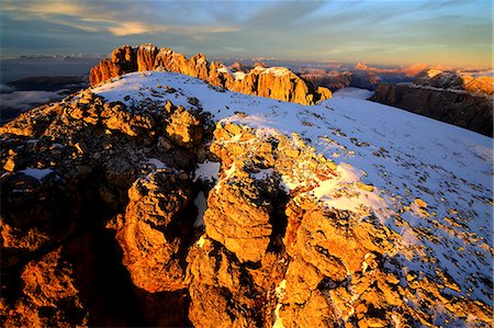 simsearch:879-09034000,k - Aerial shot of Sassolungo and Sassopiatto at sunset. Sella Group Val Gardena. Dolomites Trentino Alto Adige Italy Europe Photographie de stock - Rights-Managed, Code: 879-09034094